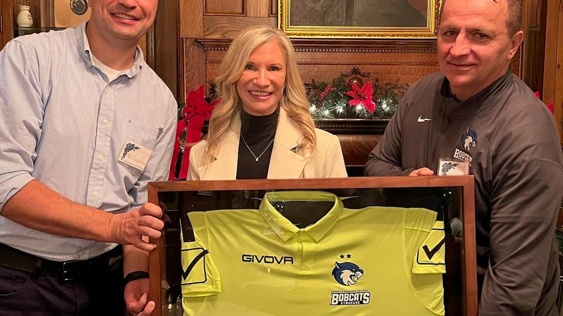 &ldquo;Champion of Commitment:  Bryant &amp; Stratton-Syracuse Bobcats Honor Sue Cumoletti with Commemorative Jersey for Decades of Dedication to Athletic Programs &amp; College Success&rdquo; Thumbnail